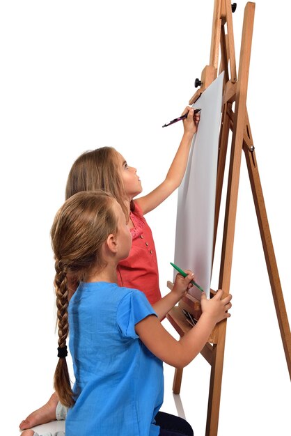 Photo two little girl painting
