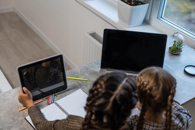 Two little girls doing their school homework