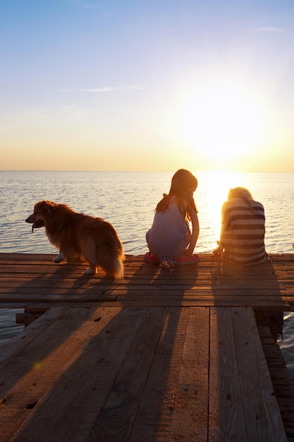 Two little girls on the pier