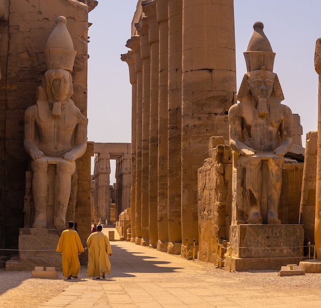 Two local men visiting the Egyptian Temple of Luxor