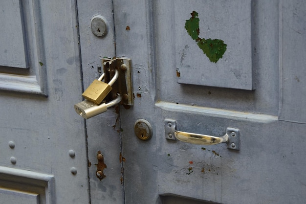 Two locks on an old wooden door closeup La Paz Bolivia