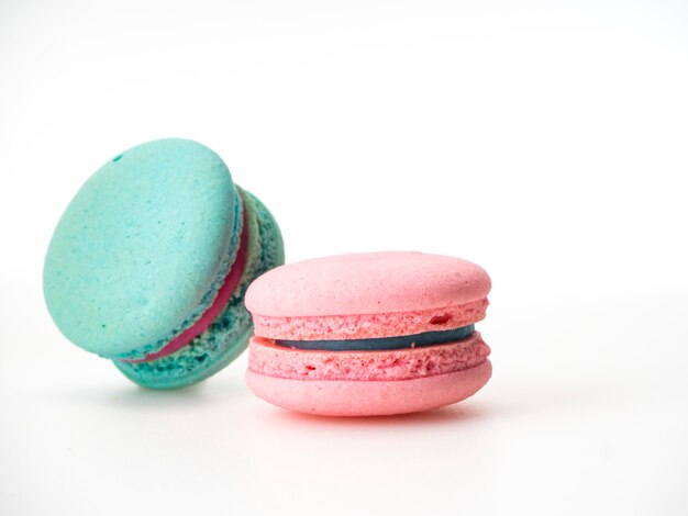 Two macarons love on white 