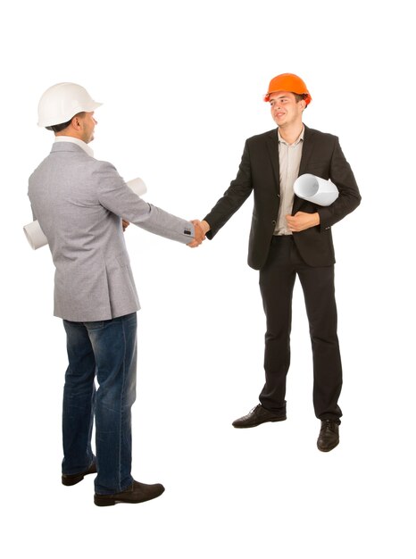 Two Male Young Engineers Shaking Hands Isolated on White Background.