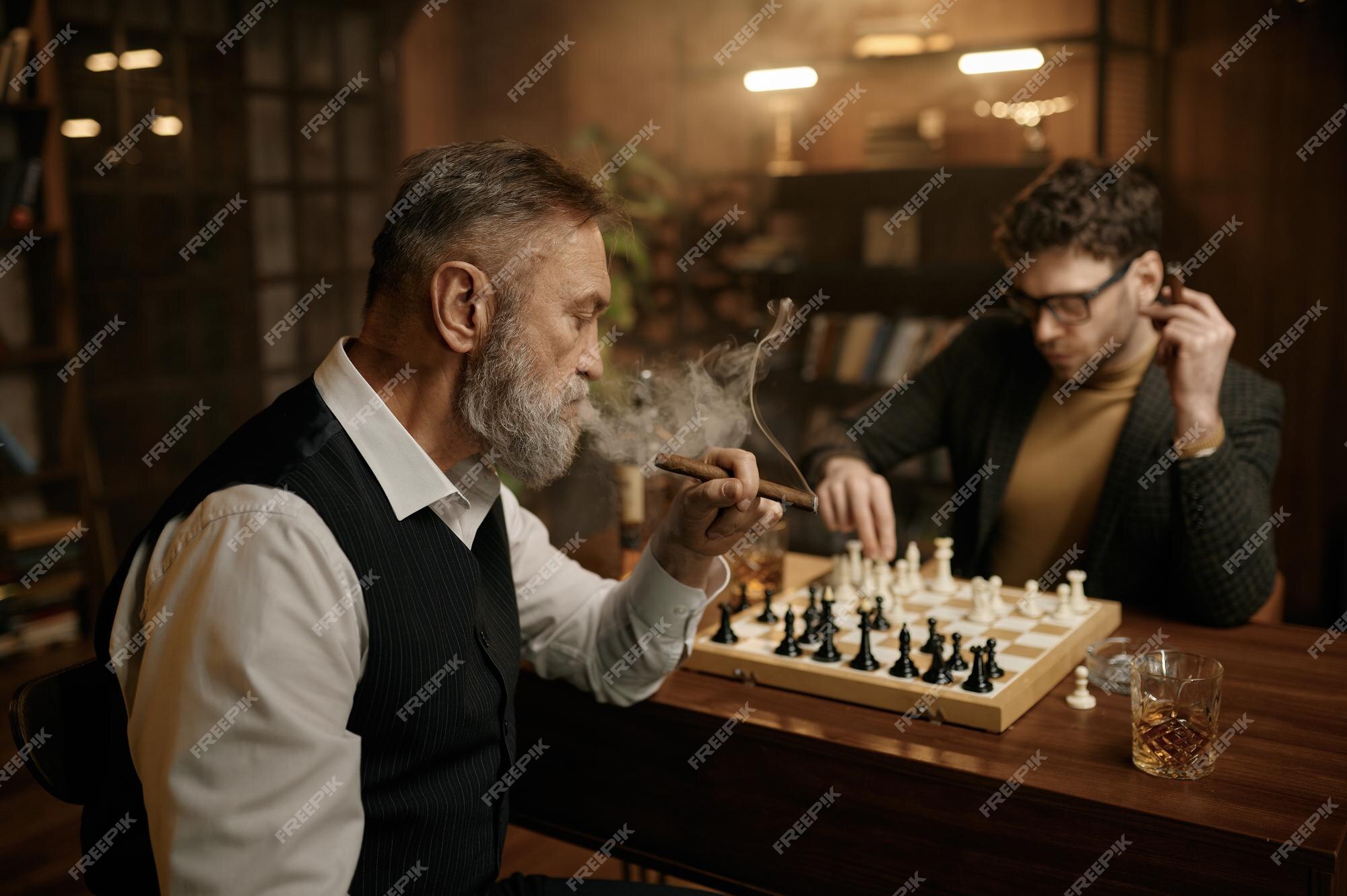 Chess players two man sitting and playing Vector Image