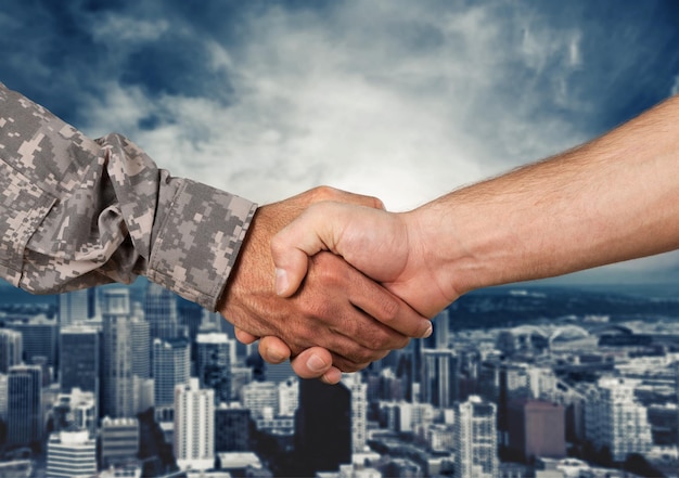 Two men handshaking,close up