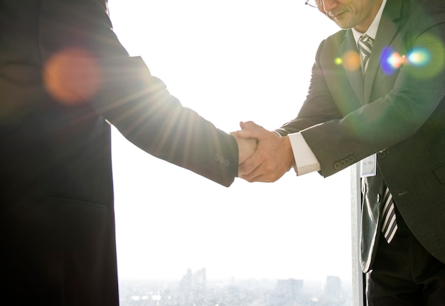 Two men shaking hands