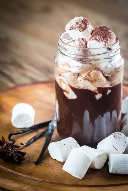 Two mugs of hot chocolate with marshmallows