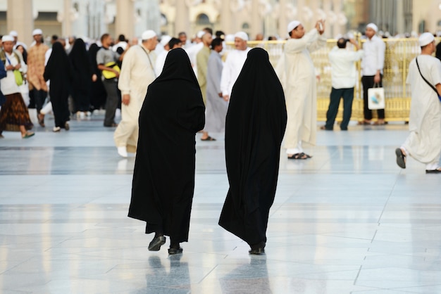 Two Muslim women walking