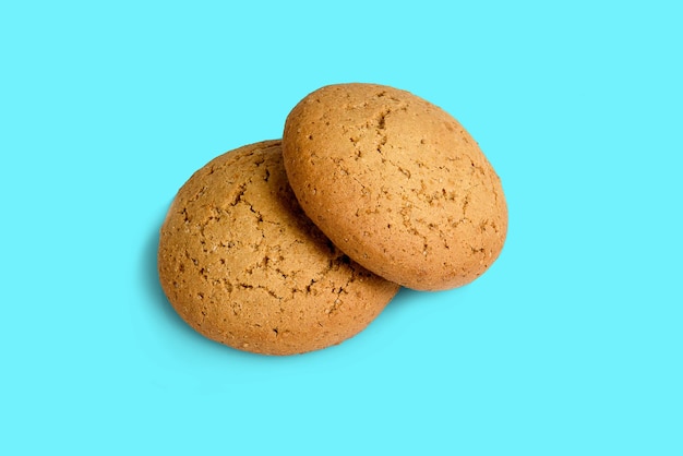 Two oatmeal Cookies on white background