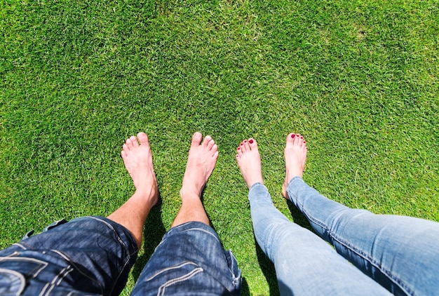 Two pairs of bare feet