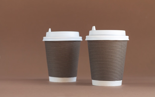 Two paper corrugated coffee cup with cap