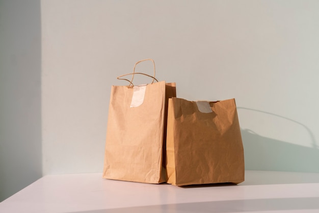 The two paper packages with food delivered to home