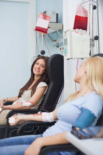 Two patients receiving a blood transfusion