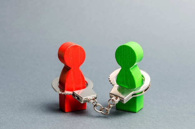 two people are handcuffed to each other unclosed obligations between two persons