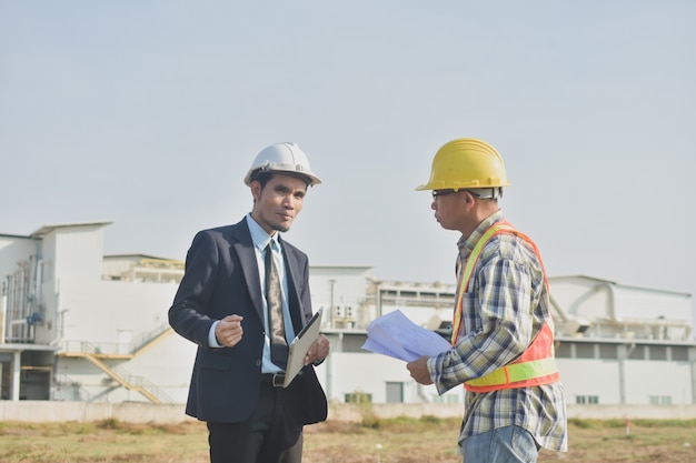 Two people businessman talking communication Architecture construction building project