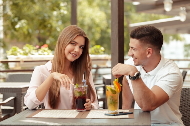 Two people in cafe enjoying the time spending with each other