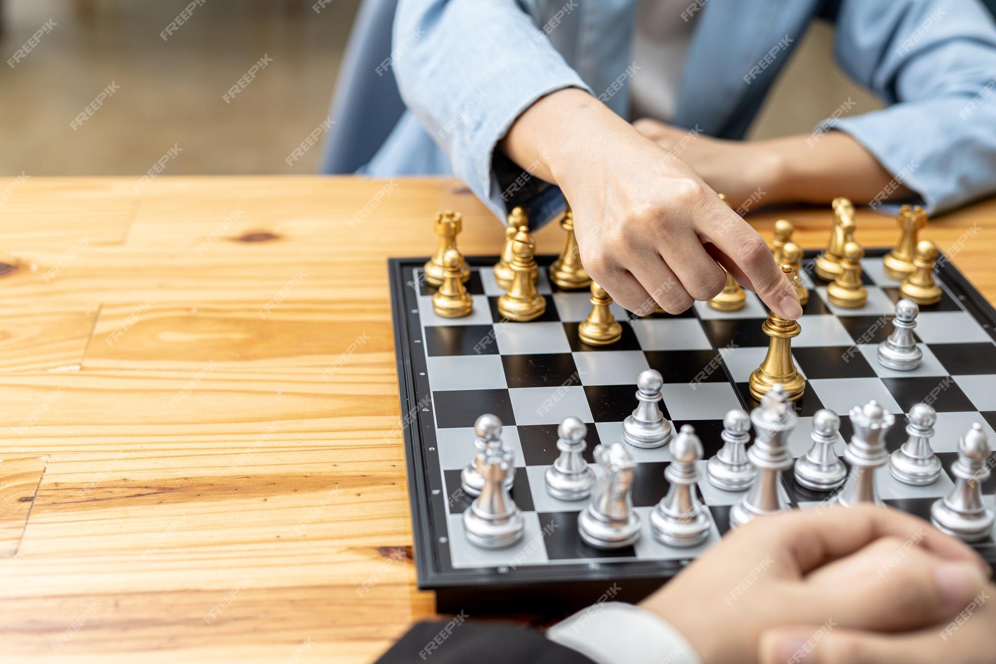 Premium Photo  Two people playing a game of chess, concept image