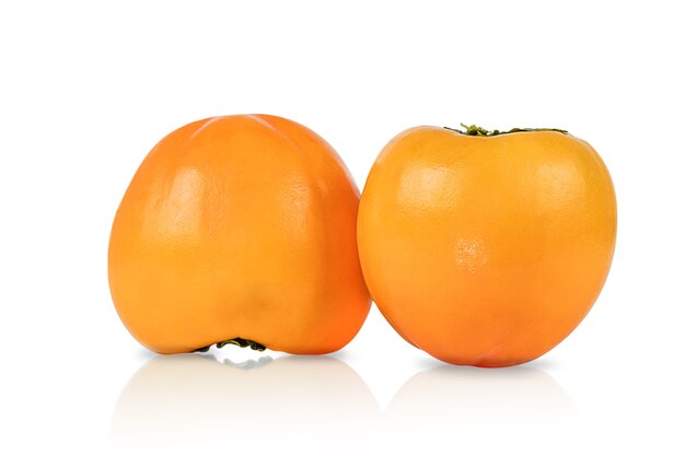 Two persimmon fruits isolated on white background