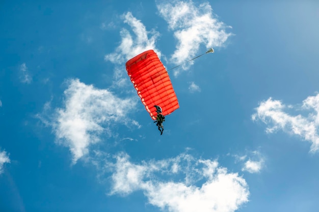 Two-person parachute descent seen from below