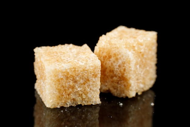 Two pieces of brown sugar Cane sugar