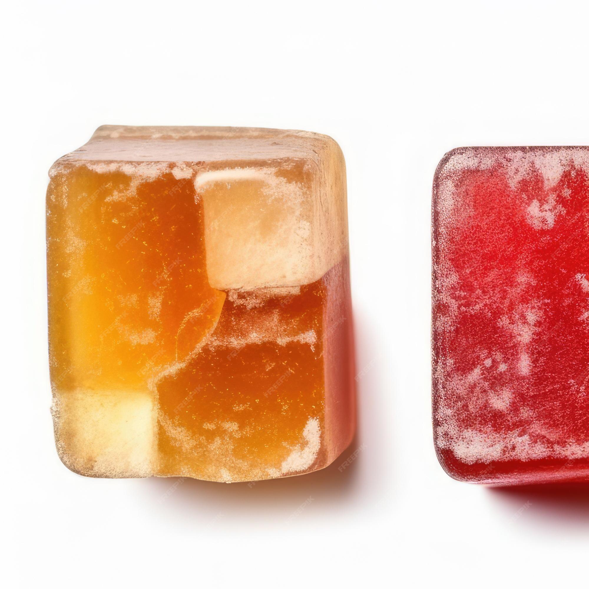 Premium Photo | Two pieces of candy are shown with one that has the number  3 on it.