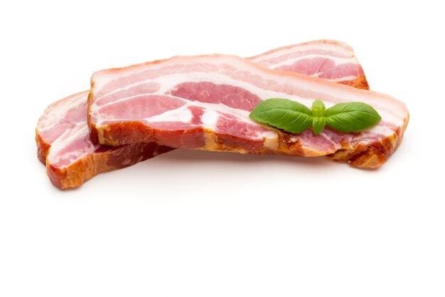 two pieces of raw pork lard isolated on white background, close-up.