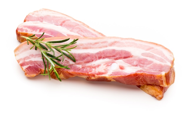 Two pieces of raw pork lard isolated on white surface, close-up.