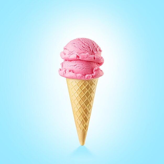 Two pink strawberry ice cream scoops served on a crispy waffle cone on blue background