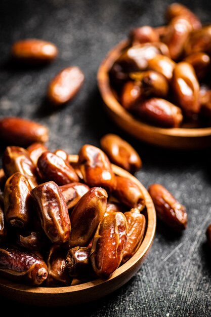 Two plates of dates on the table