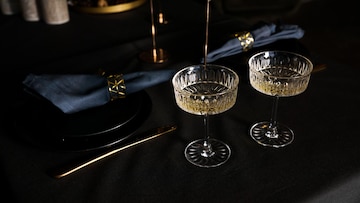 https://img.freepik.com/premium-photo/two-popular-vintage-champagne-glasses-dark-background-lux-served-table-festive-dinner-romantic-date-concept_126267-10032.jpg?w=360
