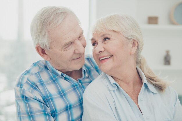   two pretty aged people pair piggyback family portrait