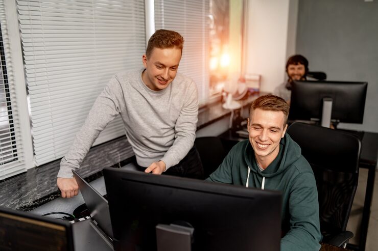 Photo two programmers working on new project. developing programming and coding technologies.