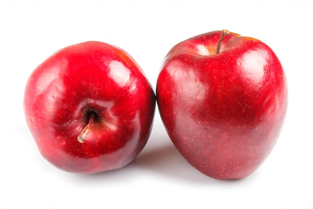 Two red apples isolated on white.