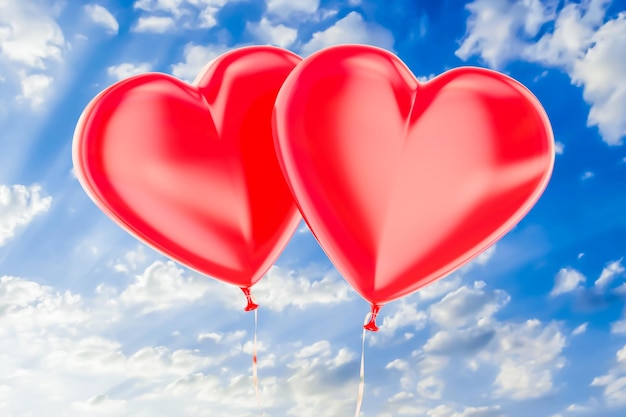 Two red balloons in the shape of hearts flying on a blue sky 3D rendering