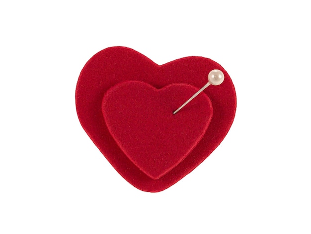 Two red hearts joined by a pin as a concept of marriage and eternal love