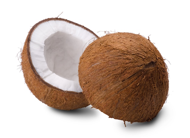 Two ripe coconut halves isolated