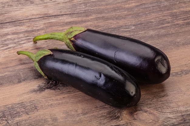 Two ripe raw eggplant isolated