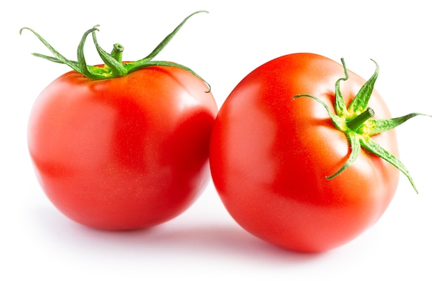 Two ripe red tomatoes isolated on white background