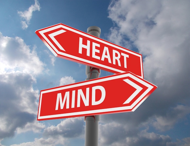 Two road signs - heart or mind choice