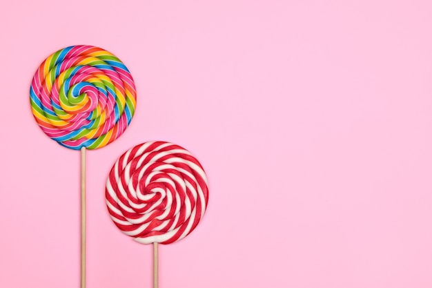 Two round multicolored lollipops