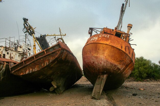 Two rusty and abandoned fishing boats