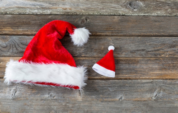  two Santa Claus caps (Large and small) 