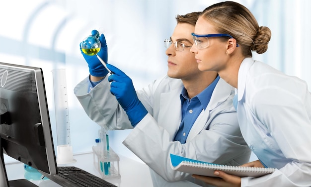 Two scientists conducting research in a lab environment