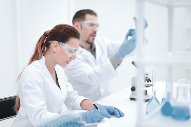 Two scientists work in the laboratory