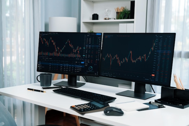 two screens of dynamic stock market exchange graph showing computer infobahn