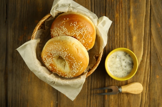 Two sesame bagels on the rattan basket