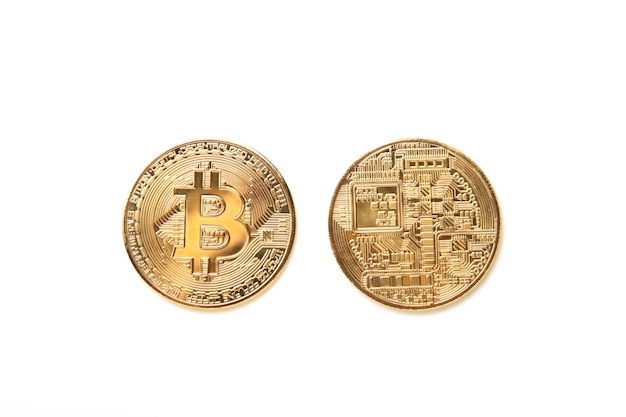 Two sides of one bitcoin closeup with BIT symbol isolated on white background Head and tail sides Cryptocurrency background for virtual money Top view