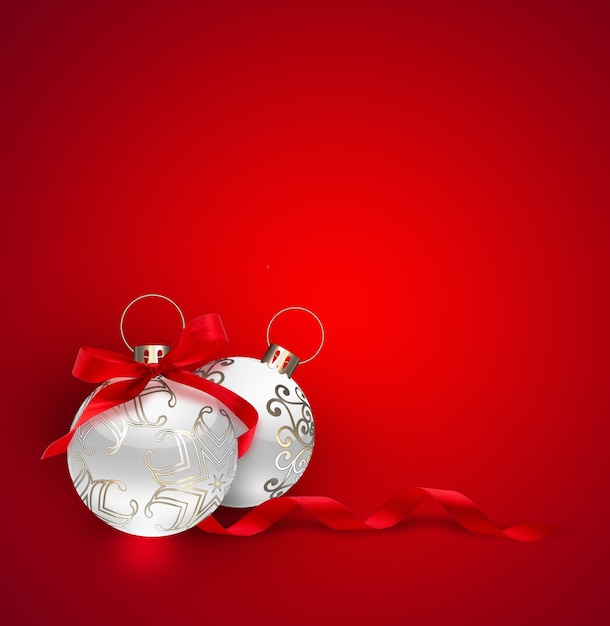 Two silver Christmas ball with ribbon and bow on red background