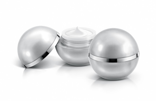 Two silver sphere cosmetic jars