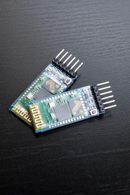 Two small green boards for electronic device